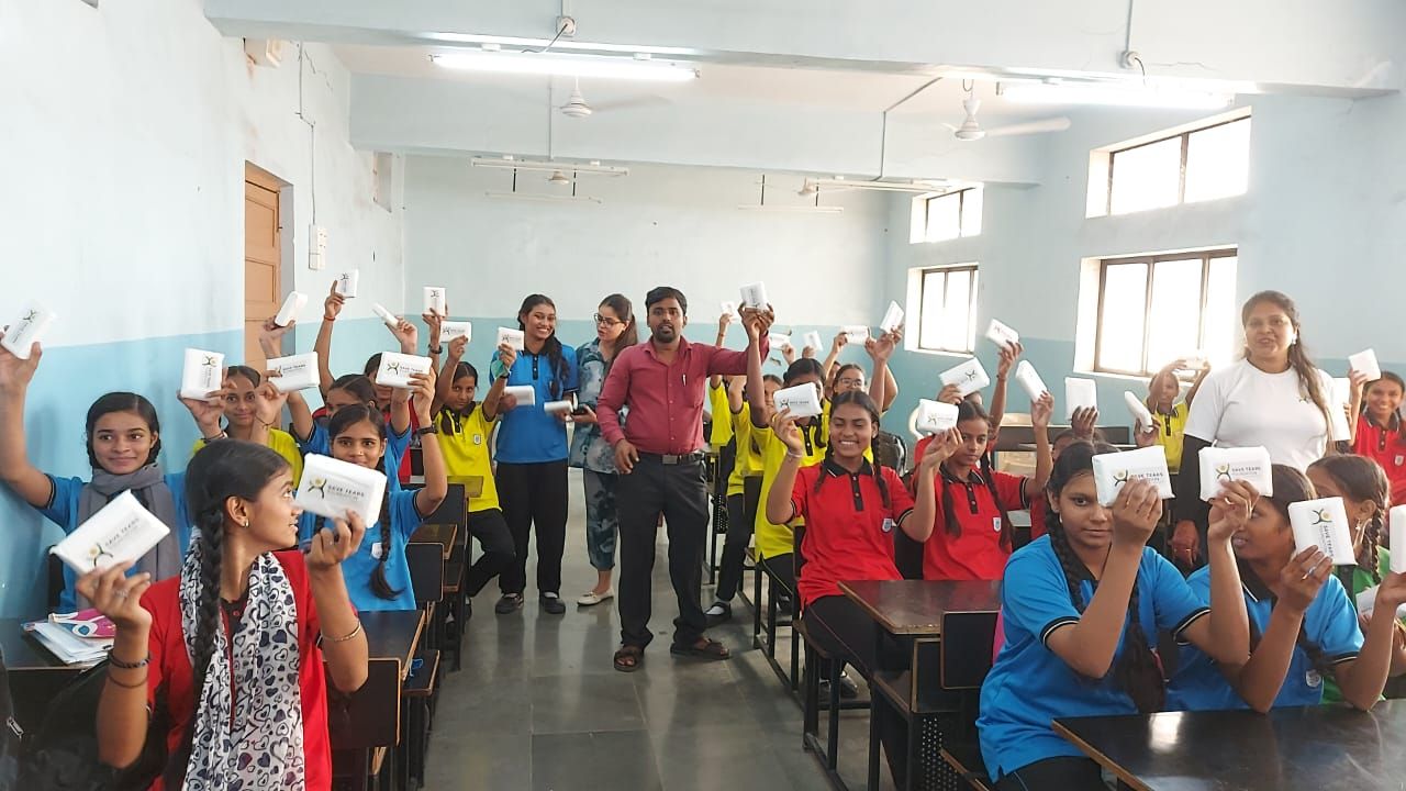 Students raising their hands at a session