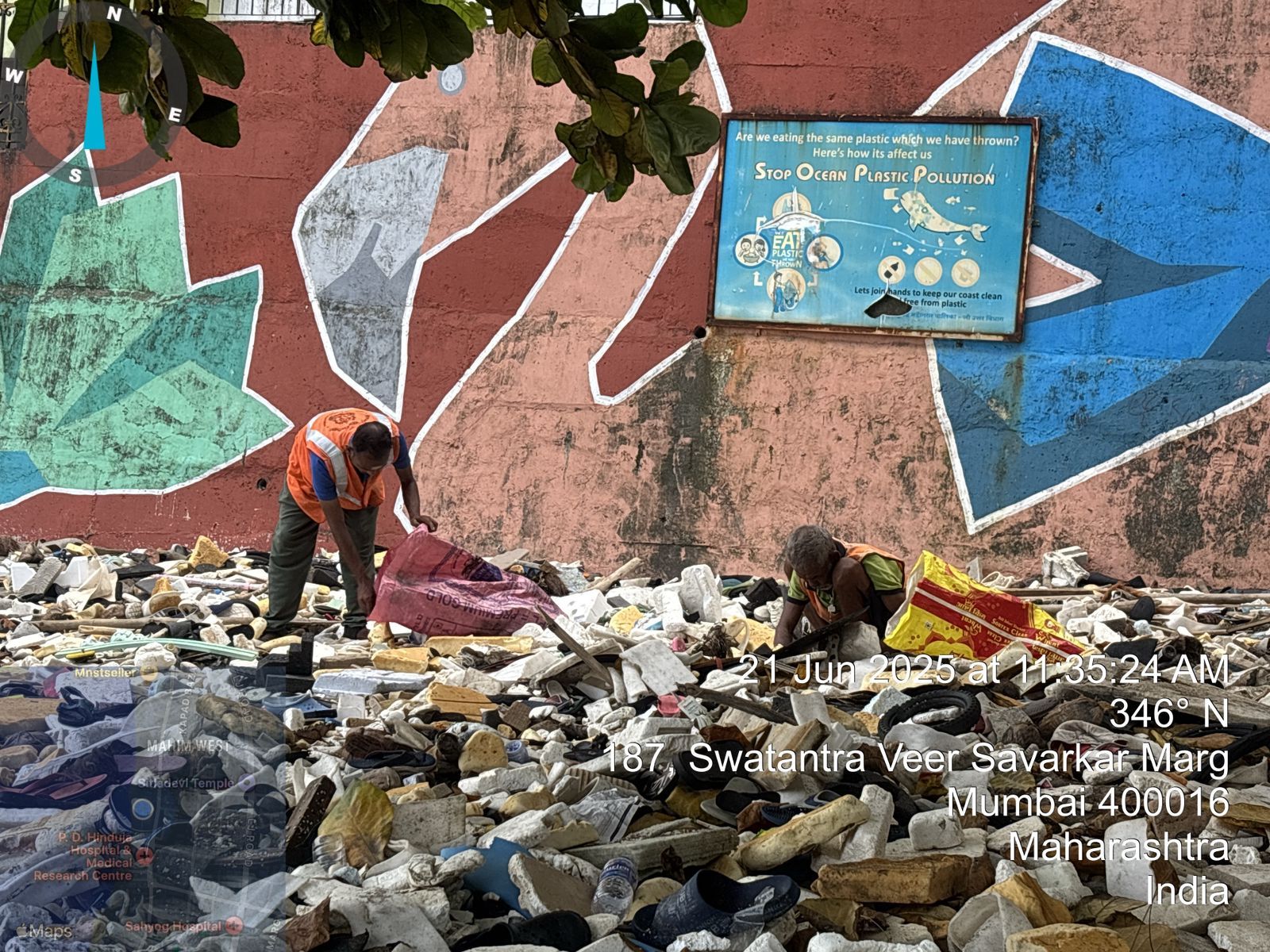 Waste-pickers sorting recovered waste at a collection point